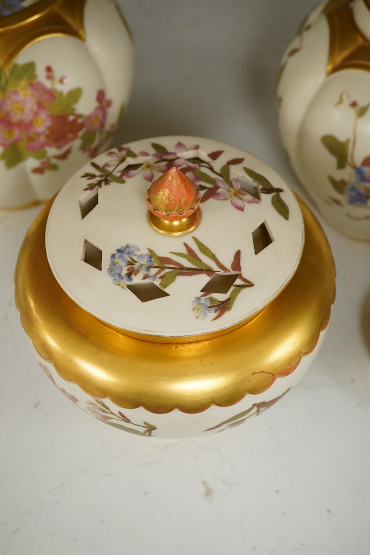 Three 19th century Worcester blush ivory potpourri or biscuit jars and covers, two with liners, each decorated with flowers and buds, largest 20cm high